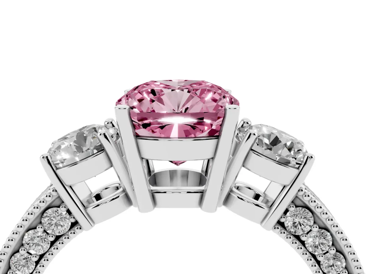 Fancy Pink Cushion Cut Three-Stone Diamond Ring with Pavé Band and Four-Prong Setting Silver