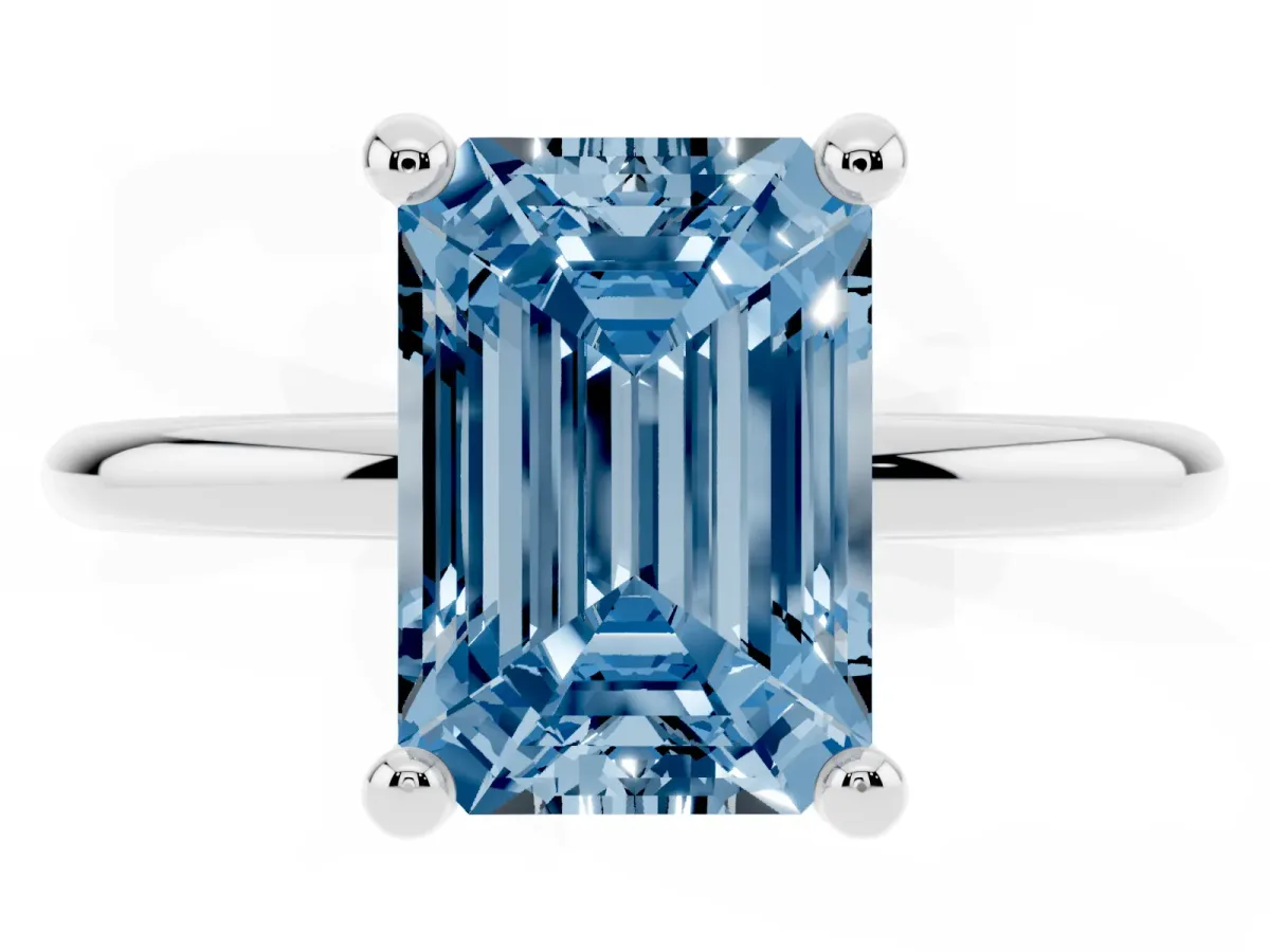 Fancy Blue Emerald Cut Solitaire Diamond Ring with 4-Prong Setting on a Classic Band Platinum