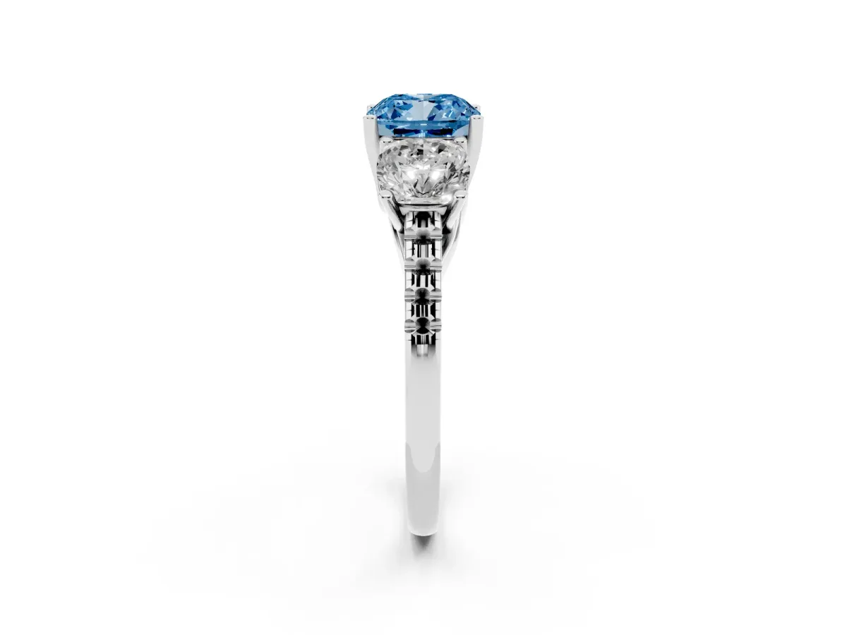 Fancy Blue Three-Stone Cushion Cut Diamond Ring with Round Pavé Band and Prong Setting Silver