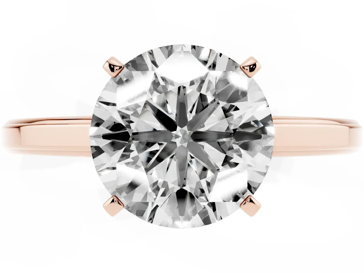Round Cut Solitaire Diamond Ring with Four-Prong Setting and Classic Band Rose gold