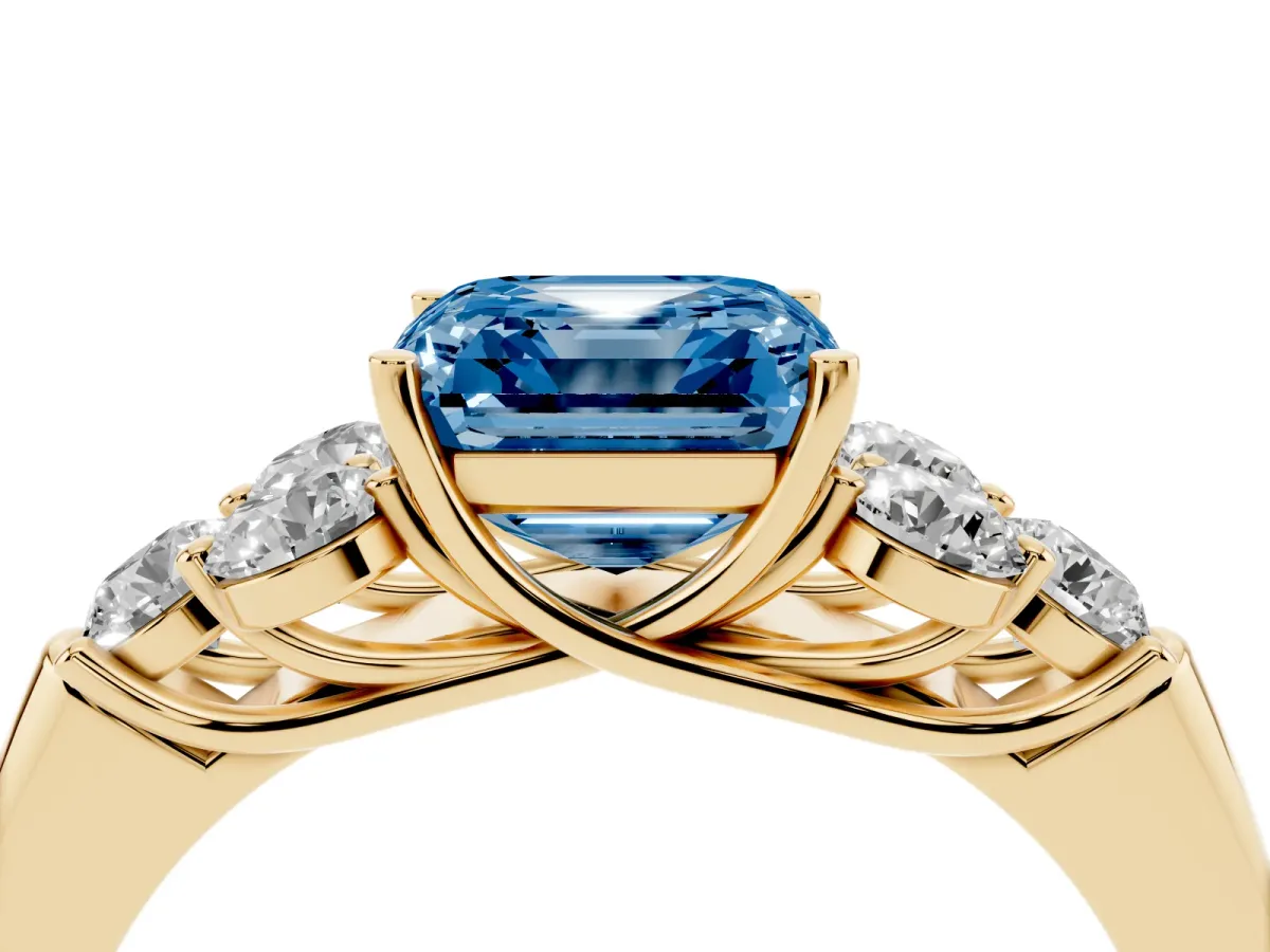 Fancy Blue Asscher Cut Cut Diamond Cluster Ring with Round Accent Stones and Prong Setting on a Classic Band Yellow gold
