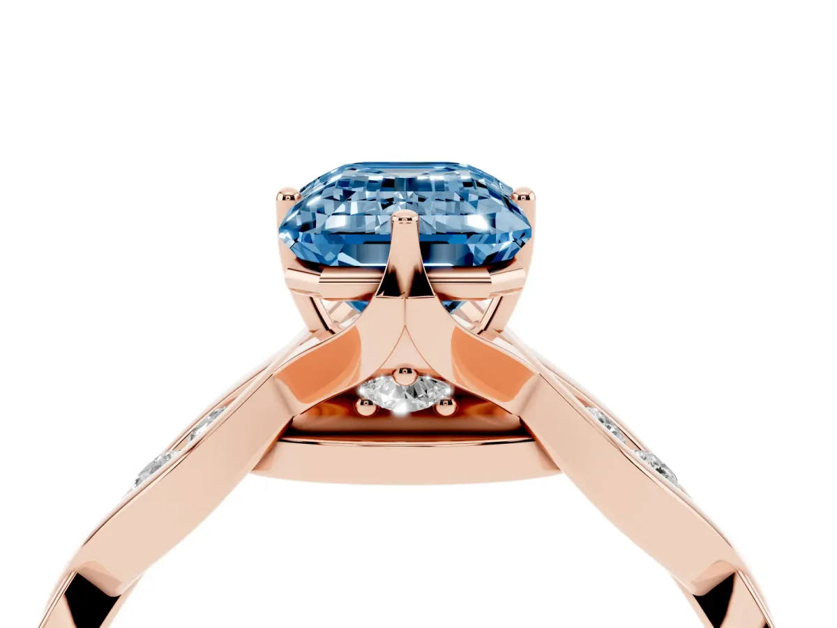 Fancy Blue Emerald Cut Solitaire Twist Band with Leaf Prong Setting Rose gold