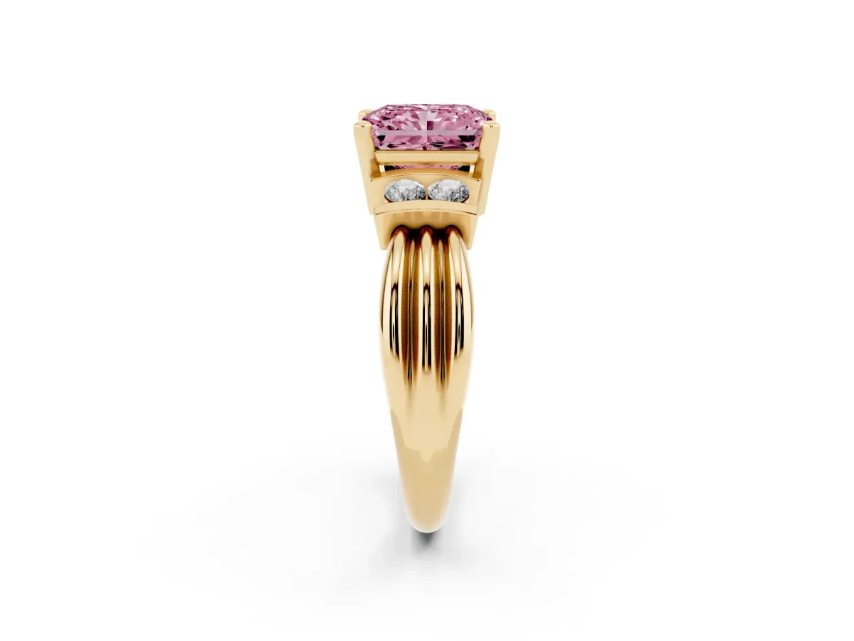 Fancy Pink Radiant Cut Cut Three-Stone Channel Set Ring with Bar Prongs Yellow gold