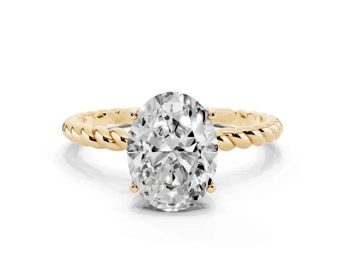 Oval Cut Solitaire Twist Band Ring with Four-Prong Setting Yellow gold