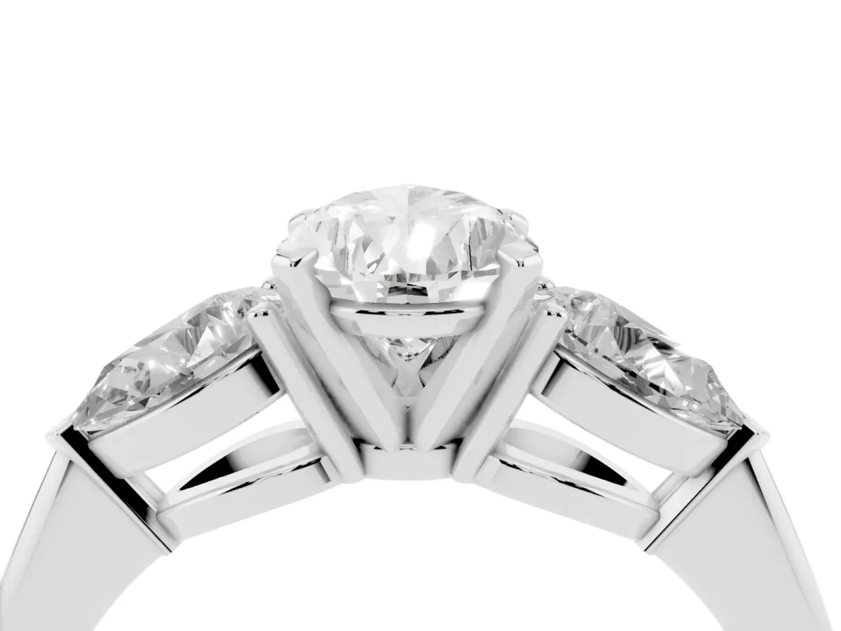 Three-Stone Pear Cut Diamond Ring with Pear Side Stones and Four-Prong Setting Silver