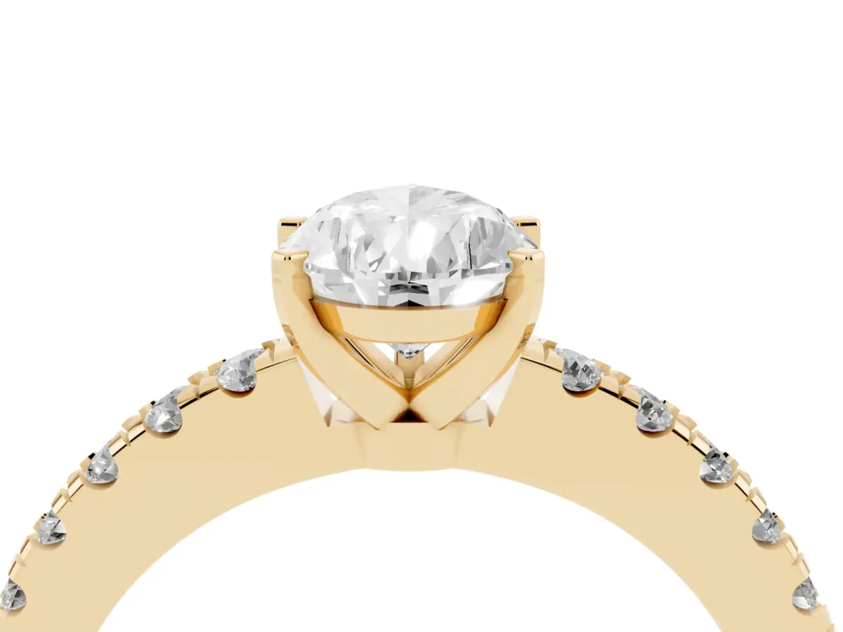 Pear Cut Solitaire Diamond with Pavé Band and Four-Prong Setting Yellow gold