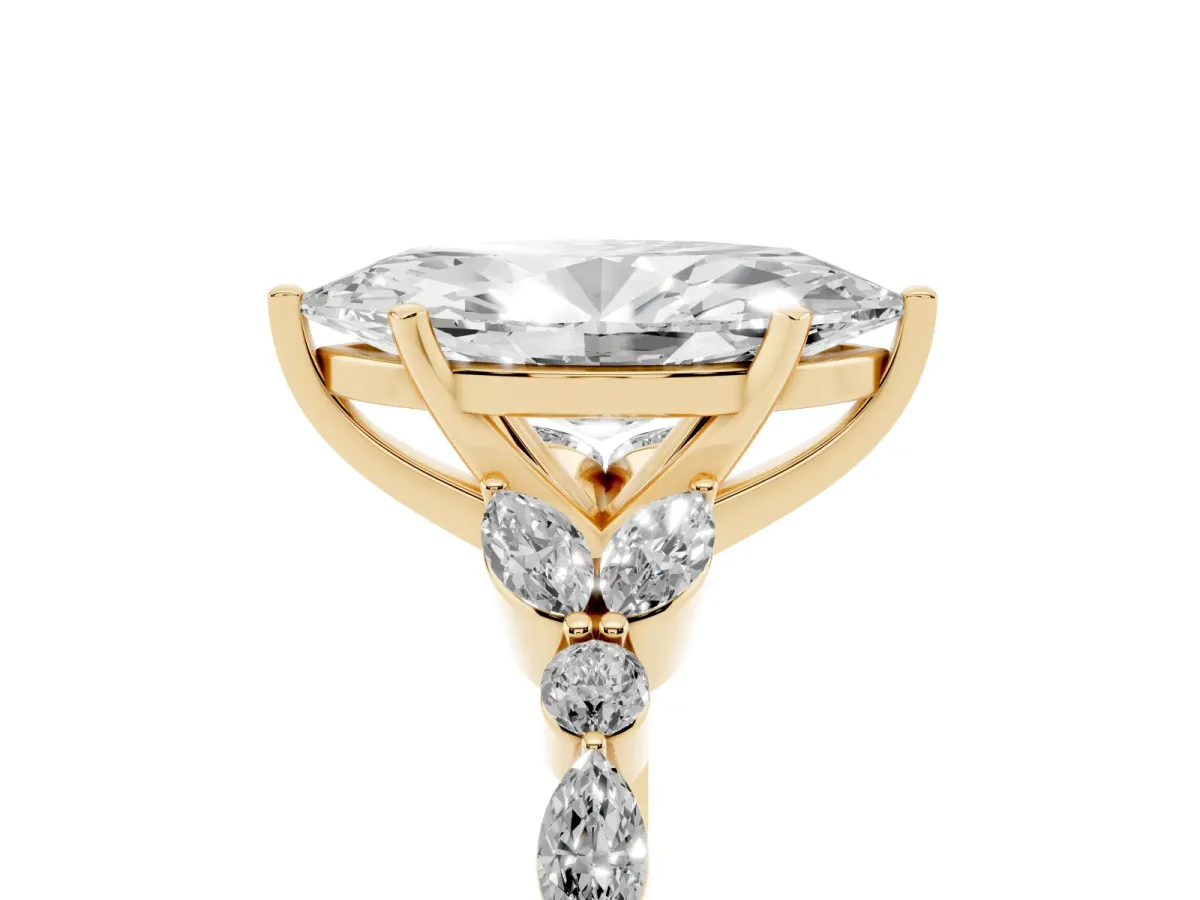 Marquise Cut Diamond Solitaire Ring with Side Stones and Four-Prong Setting Yellow gold