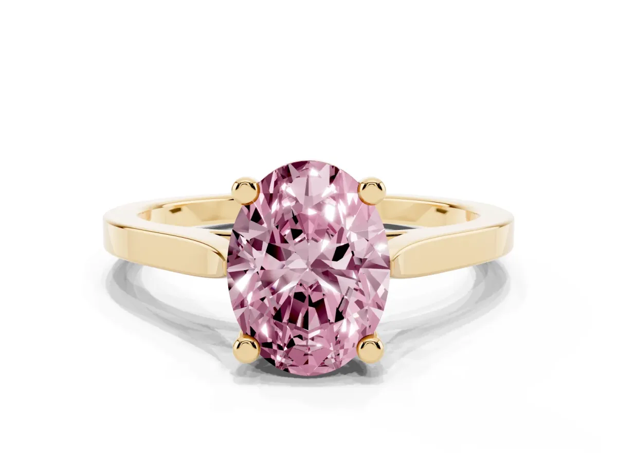 Fancy Pink Oval Cut Solitaire Diamond Ring with Four-Prong Setting and Tapered Band Yellow gold