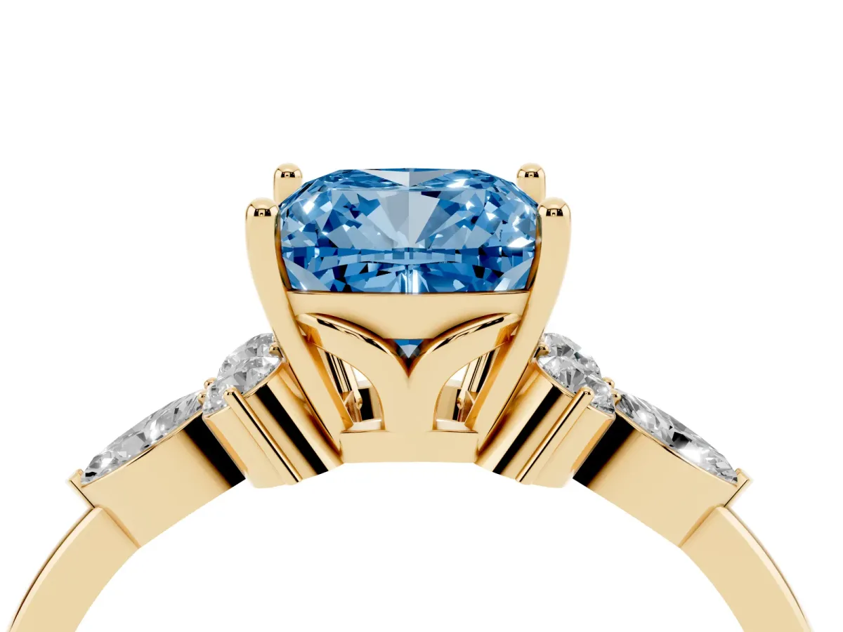 Fancy Blue Cushion Cut Brilliant Diamond Solitaire Ring with Pear Side Stones and Four-Prong Setting Yellow gold