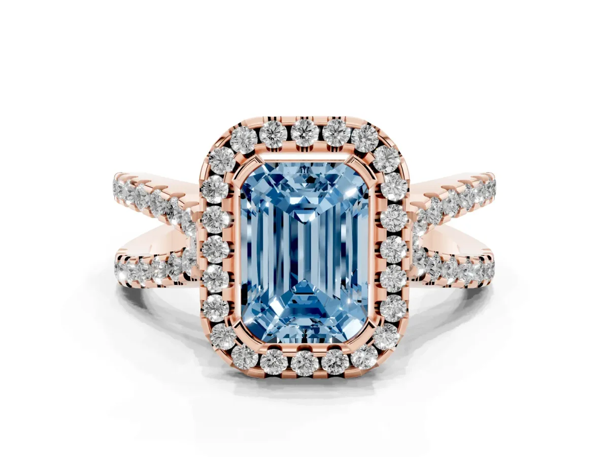 Fancy Blue Emerald Cut Diamond Halo Ring with Split Shank Pavé Band and Prong Setting Rose gold