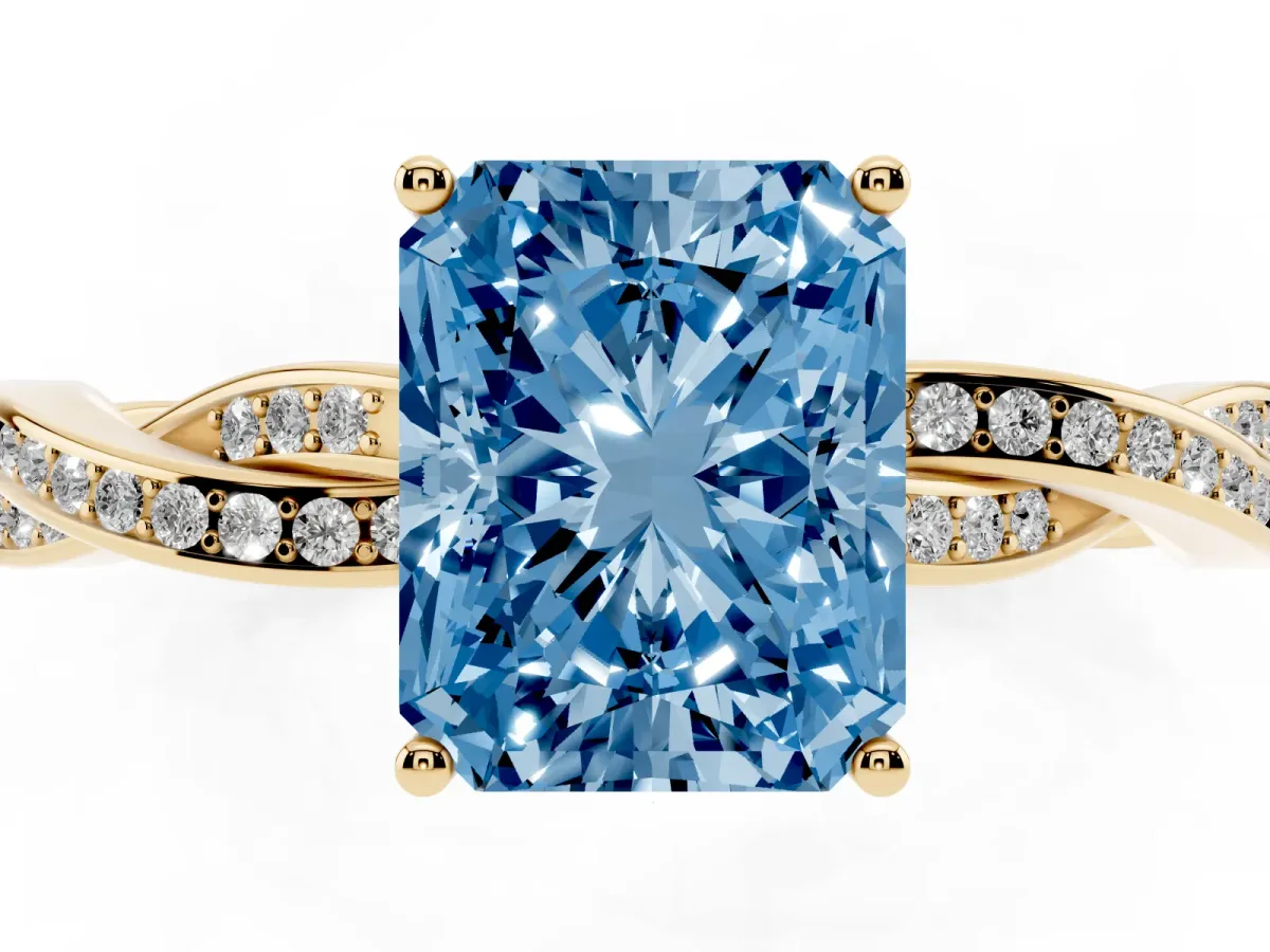 Fancy Blue Radiant Cut Solitaire Twisted Pave Diamond Ring with Four-Prong Setting Yellow gold