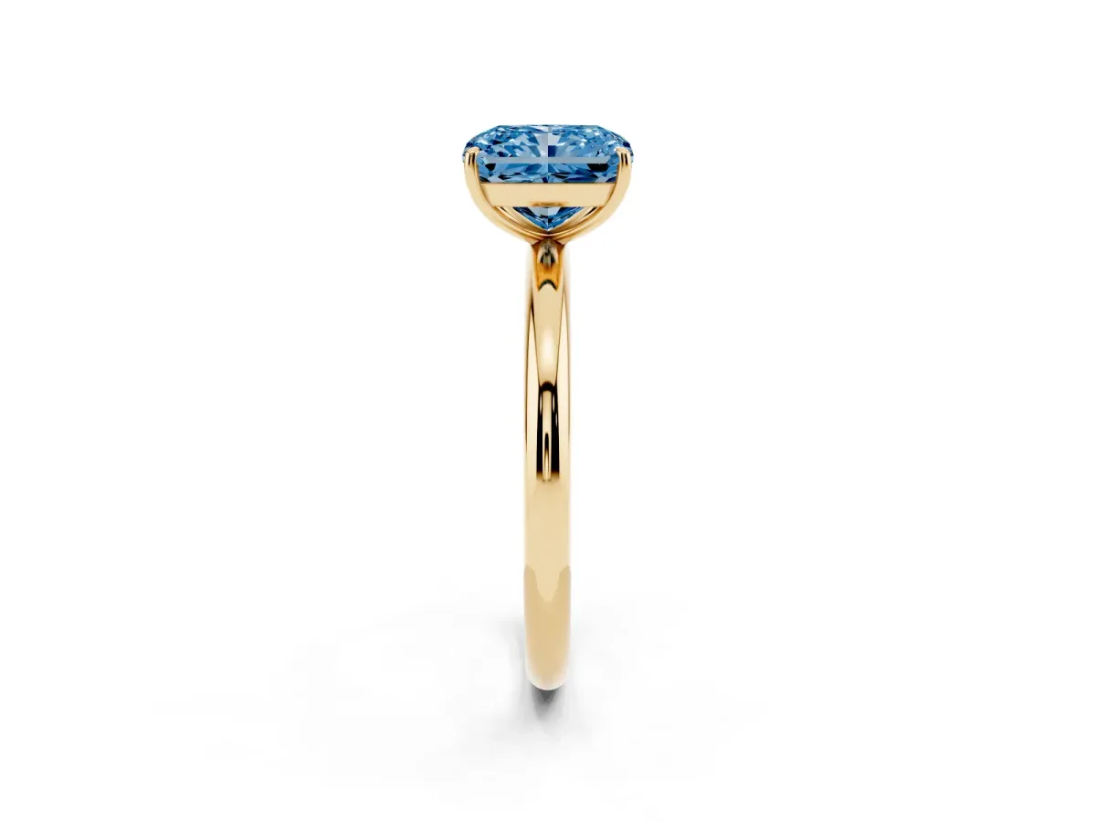 Fancy Blue Radiant Cut Solitaire Diamond Ring with Four-Prong Setting on a Plain Band Yellow gold