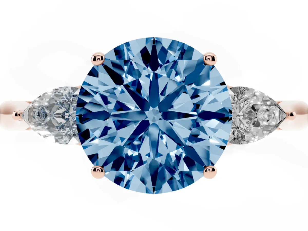 Fancy Blue Three-Stone Round Cut Diamond Ring with Pear Side Stones in Four-Prong Setting Rose gold