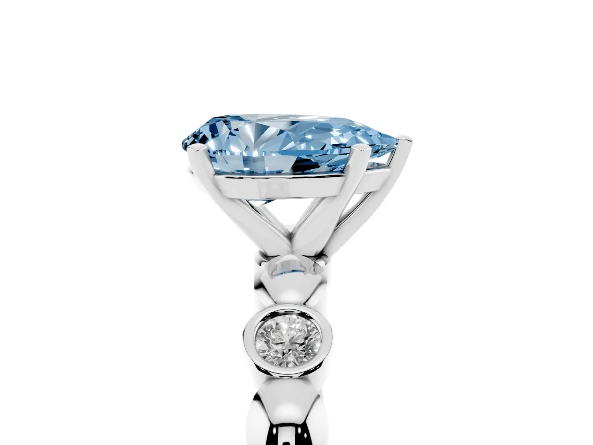 Fancy Blue Pear Cut Solitaire Bezel-Set Diamond Ring with Beaded Band and Four-Prong Setting Silver