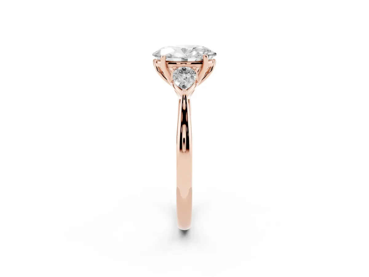Three-Stone Oval Cut Brilliant Diamond Solitaire Ring with Tapered Band and Four-Prong Setting Rose gold