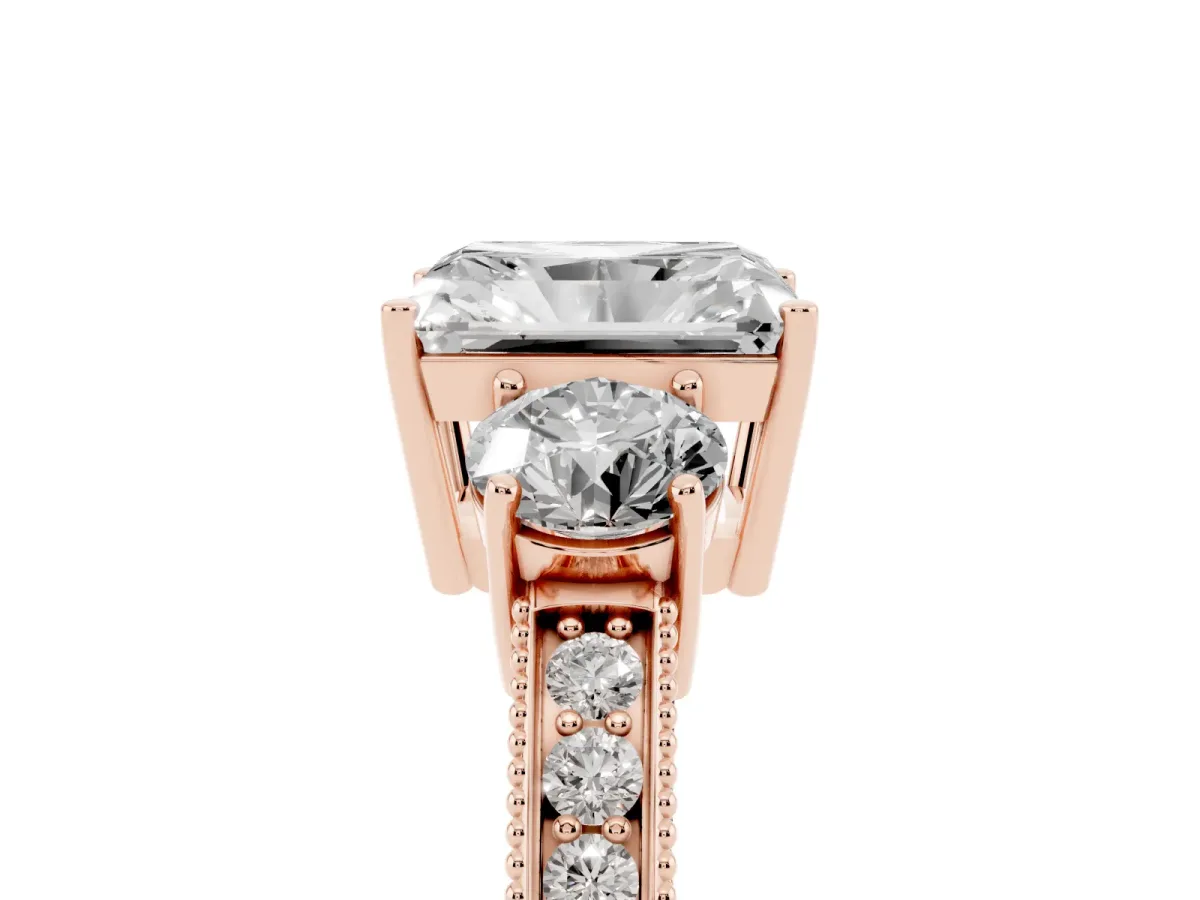Radiant Cut Three-Stone Diamond Ring with Pavé Band and Four-Prong Setting Rose gold