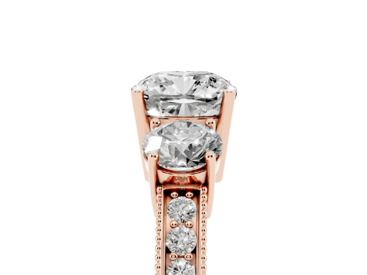 Cushion Cut Three-Stone Diamond Ring with Pavé Band and Four-Prong Setting Rose gold
