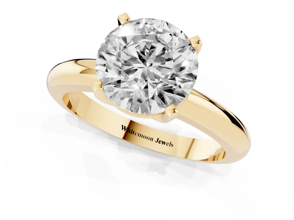 Round Cut Diamond Solitaire Engagement Ring with Round Band and Four-Prong Setting Yellow gold