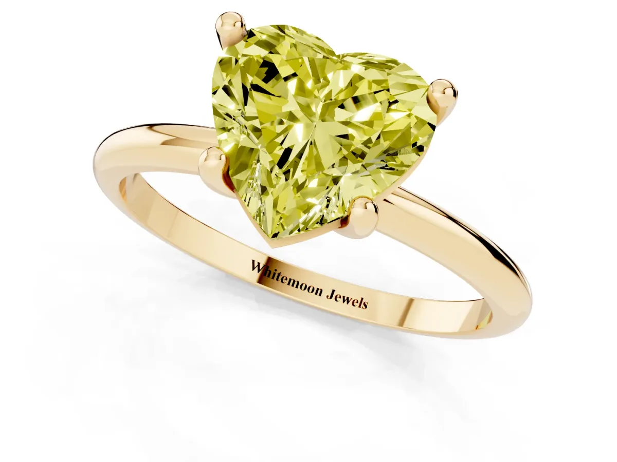 Fancy Yellow Heart Cut Solitaire Diamond Ring with 4-Prong Setting on a Classic Band Yellow gold