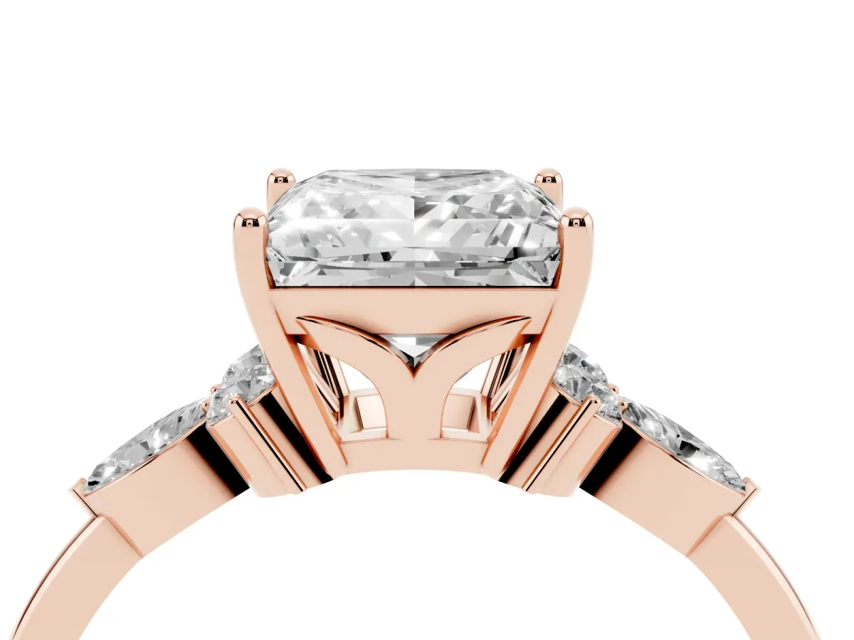 Princess Cut Brilliant Diamond Solitaire Ring with Pear Side Stones and Four-Prong Setting Rose gold