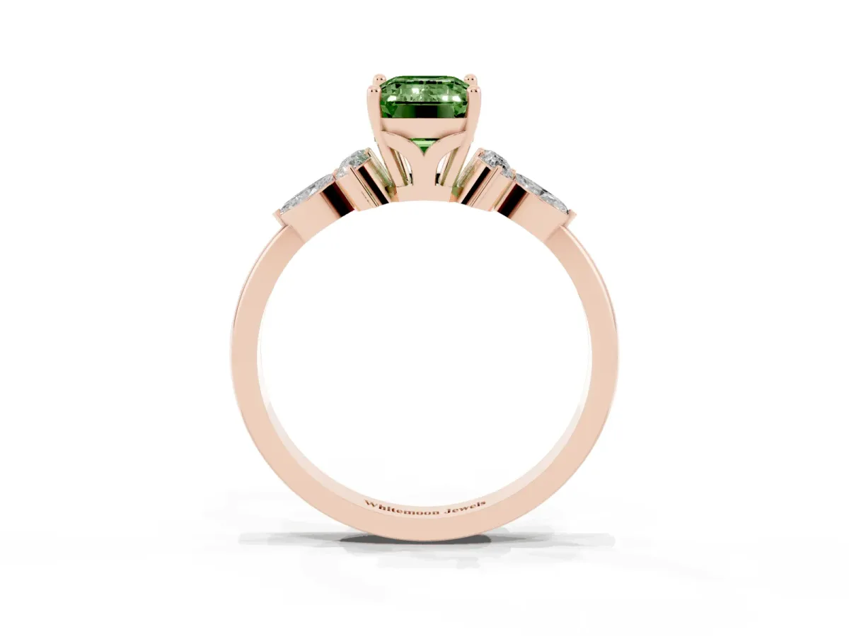 Fancy Green Emerald Cut Brilliant Diamond Solitaire Ring with Pear Side Stones and Four-Prong Setting Rose gold