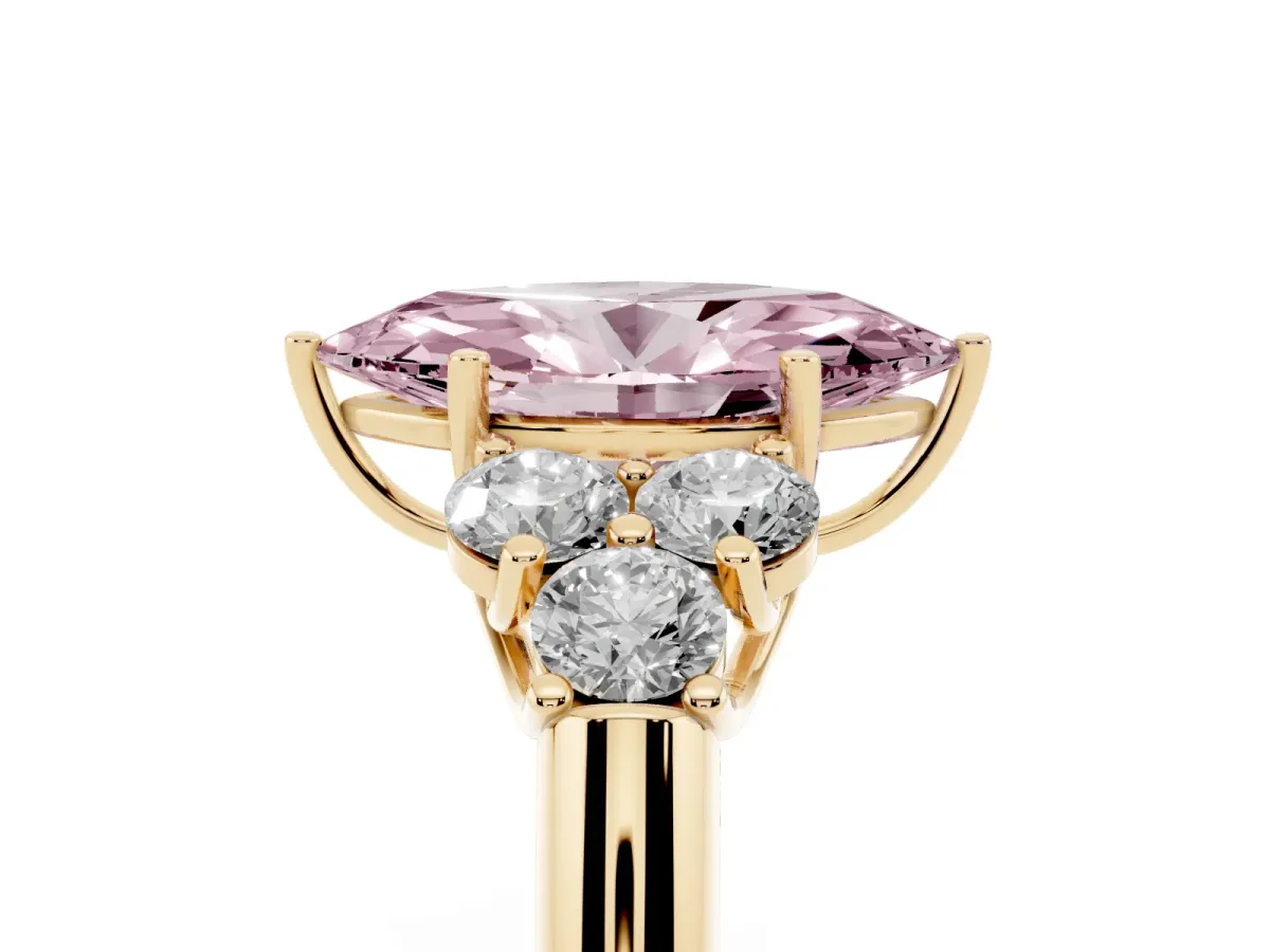 Fancy Pink Marquise Cut Cut Diamond Cluster Ring with Round Accent Stones and Prong Setting on a Classic Band Yellow gold