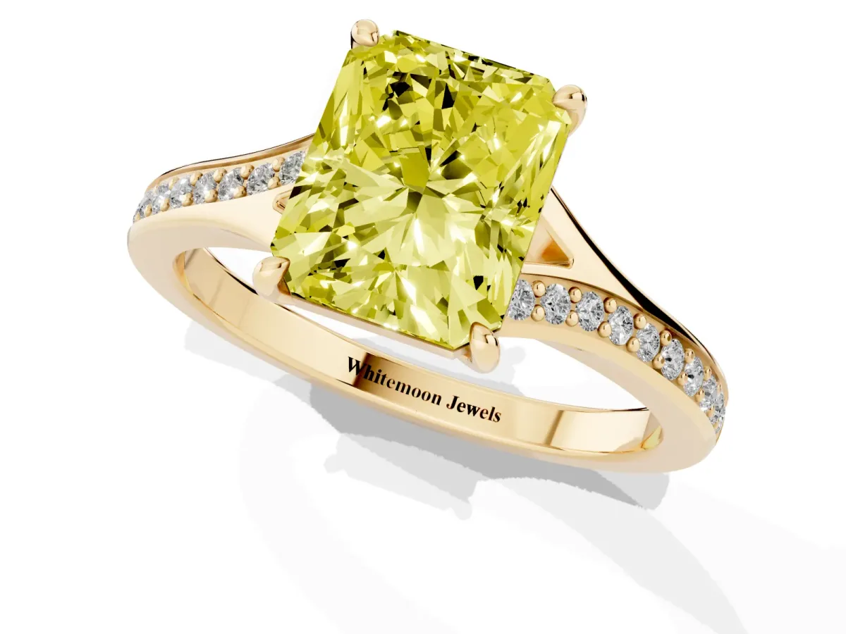 Fancy Yellow Radiant Cut Diamond Solitaire Ring with Pavé Band and Prong Setting Yellow gold