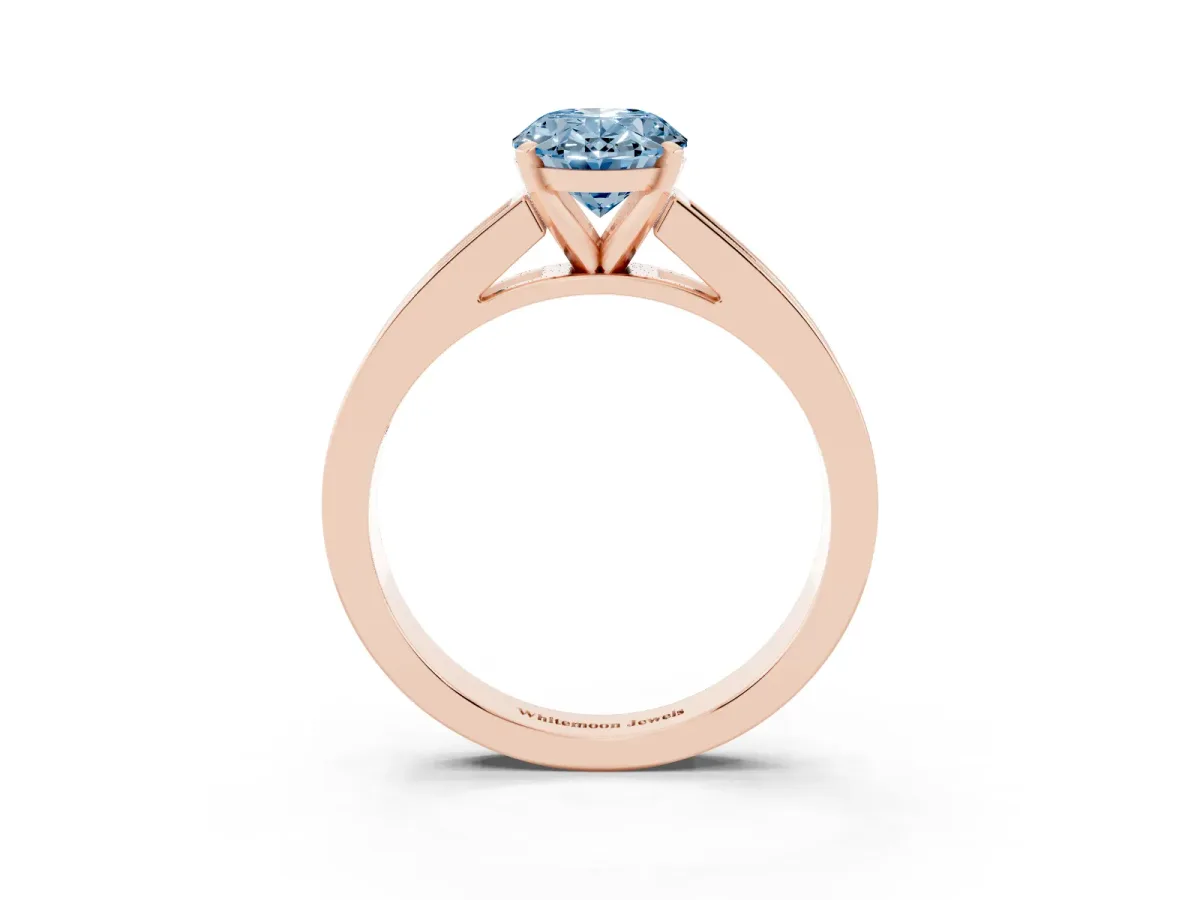 Fancy Blue Oval Cut Solitaire Diamond Ring with Channel-Set Band and Four-Prong Setting Rose gold