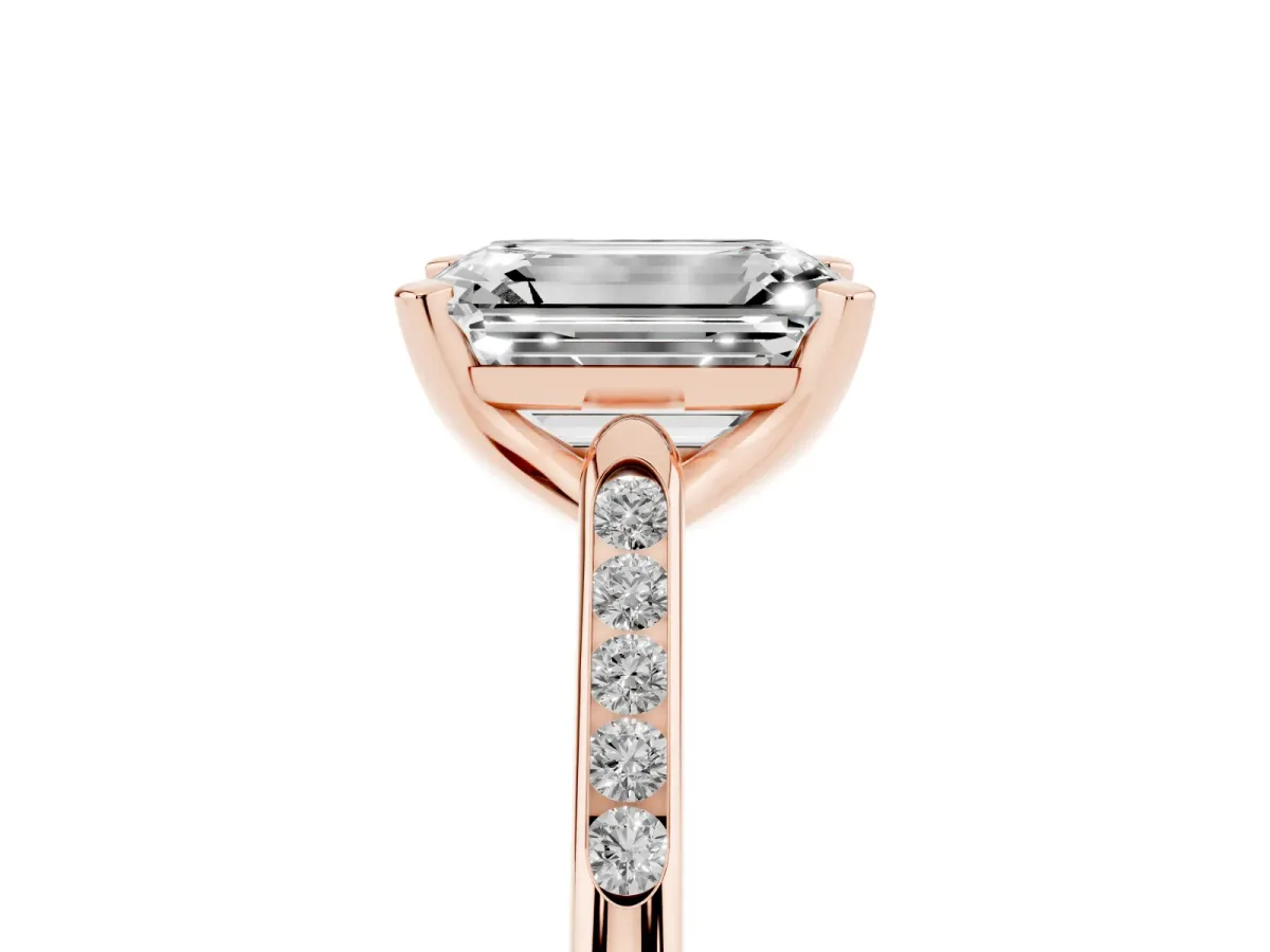 Emerald Cut Diamond Solitaire Ring with Channel Set Round Band and Prong Setting Rose gold
