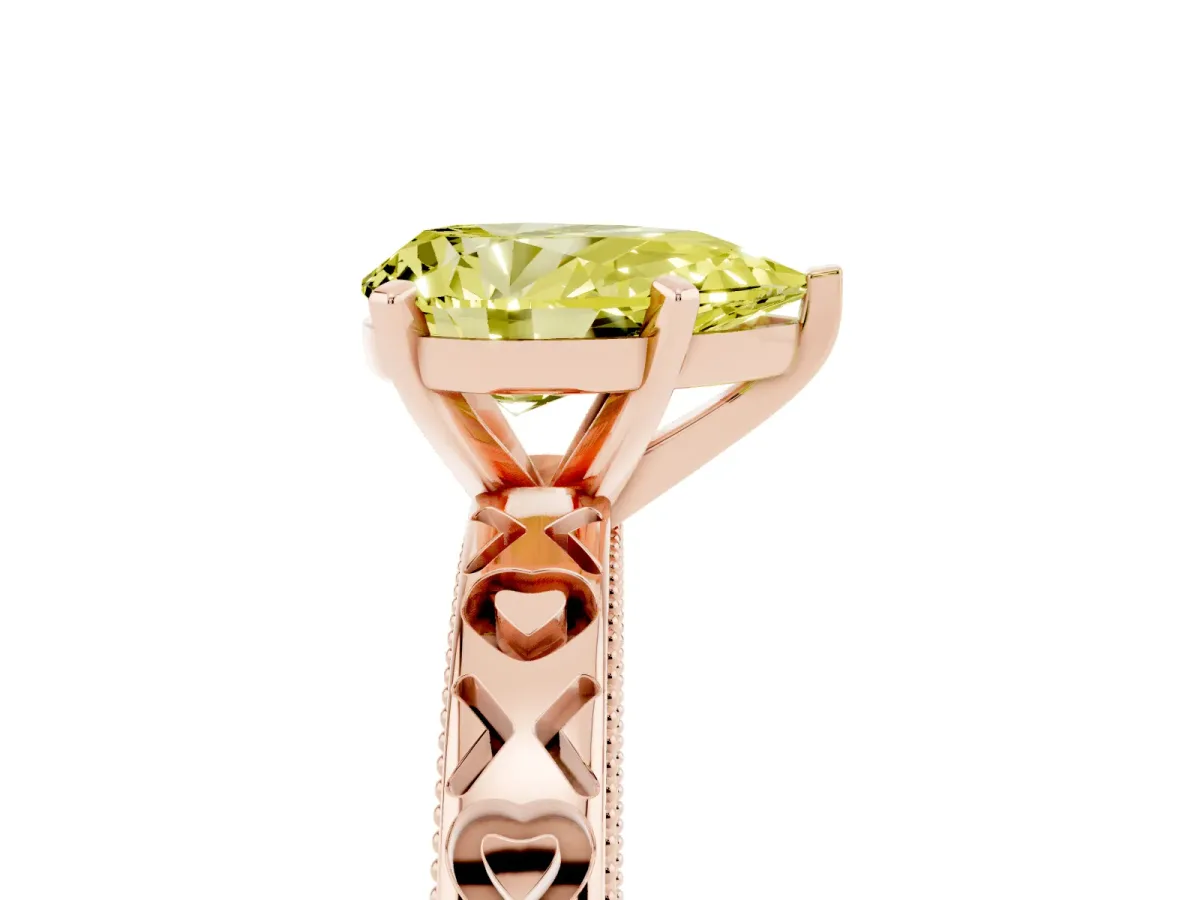 Fancy Yellow Pear Cut Solitaire Diamond Engagement Ring with XO Engraved Band and Four-Prong Setting Rose gold