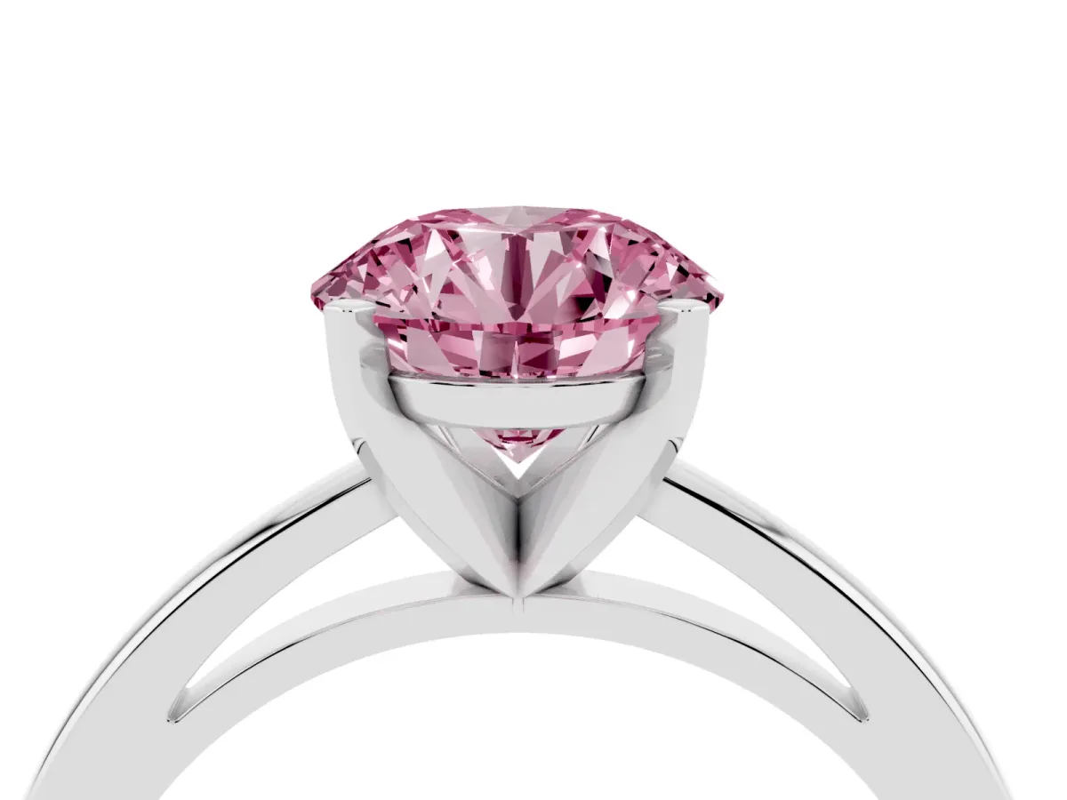 Fancy Pink Round Cut Solitaire Diamond Engagement Ring with Four-Prong Setting on a Classic Band Platinum