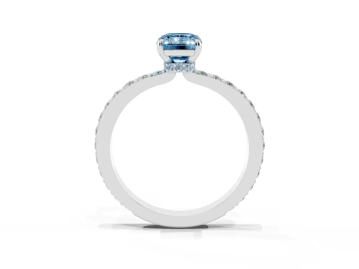 Fancy Blue Emerald Cut Diamond Solitaire Engagement Ring with Pavé Band and Four-Prong Setting Silver