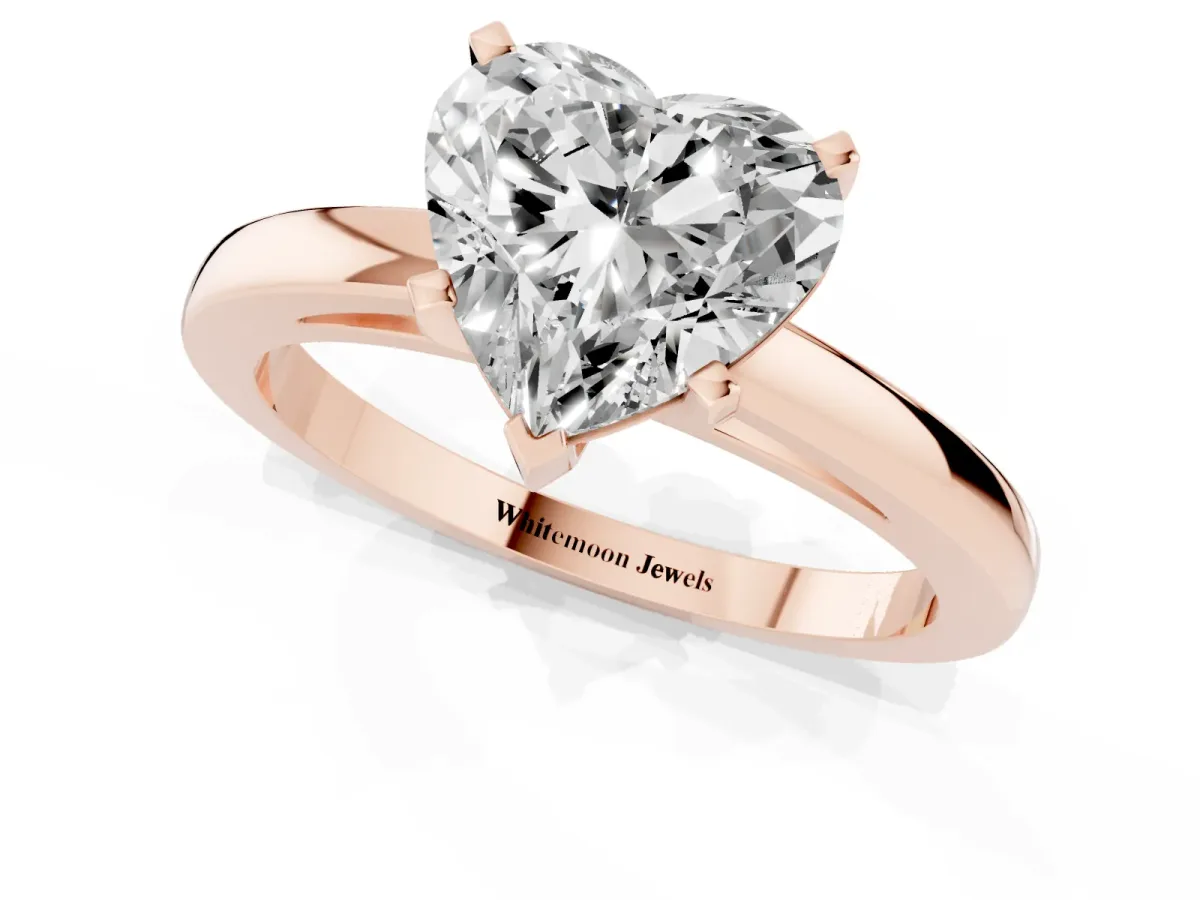 Heart Cut Solitaire Diamond Engagement Ring with Four-Prong Setting on a Classic Band Rose gold