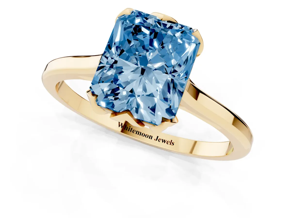 Fancy Blue Radiant Cut Diamond Solitaire Ring with Flower Prong Setting and Classic Band Yellow gold