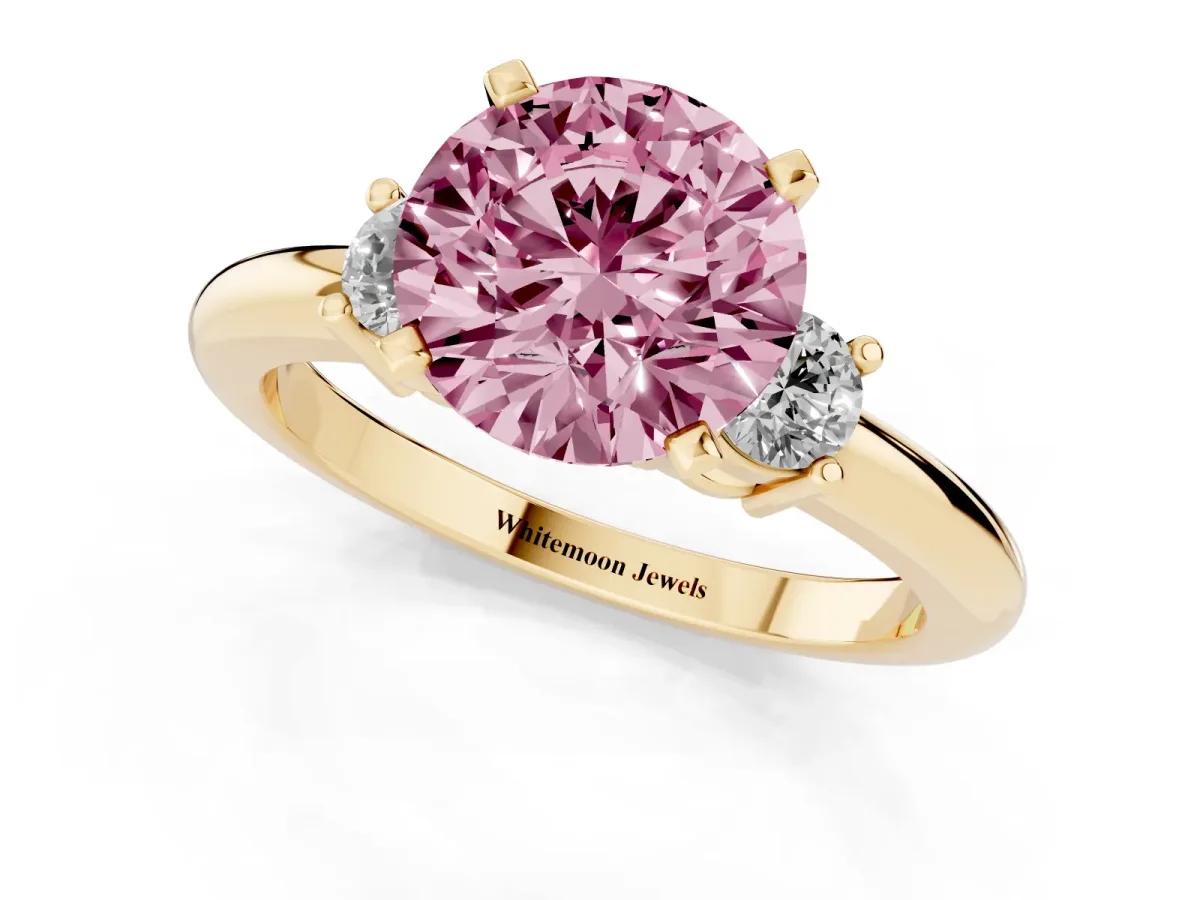 Fancy Pink Three-Stone Round Cut Cut Diamond Solitaire with Prong Setting and Classic Band Yellow gold