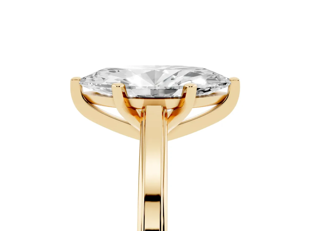 Marquise Cut Solitaire Diamond Ring with Four-Prong Setting and Classic Band Yellow gold