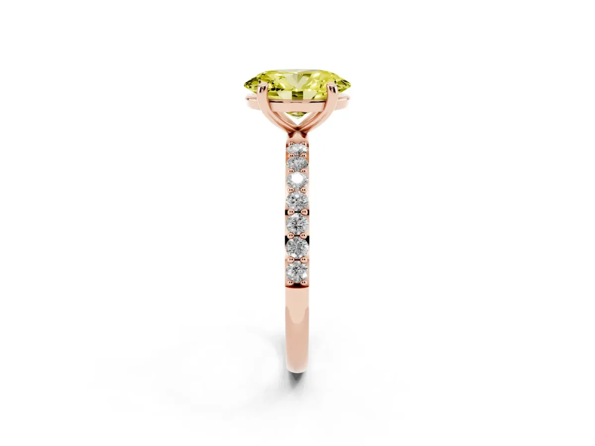 Fancy Yellow Oval Cut Diamond Solitaire Ring with Round Pavé Band and Prong Setting Rose gold
