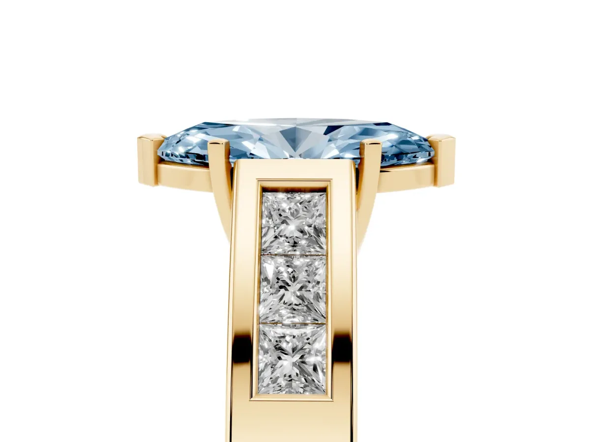 Fancy Blue Marquise Cut Cut Channel Set Solitaire Ring with Four-Prong Setting Yellow gold