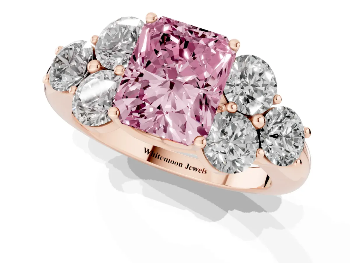 Fancy Pink Radiant Cut Cut Diamond Cluster Ring with Round Accent Stones and Prong Setting on a Classic Band Rose gold
