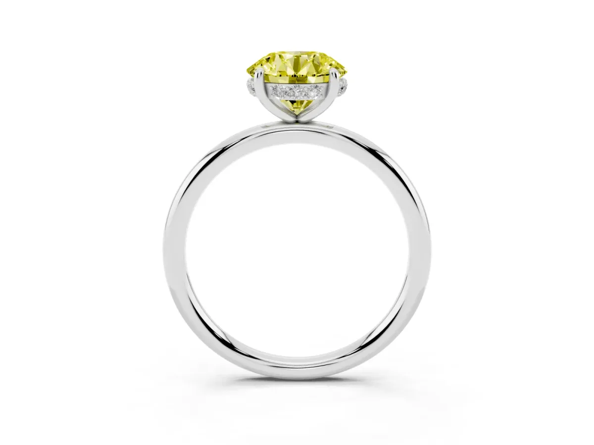 Fancy Yellow Round Cut Solitaire Diamond Ring with a Classic Band and Four-Prong Setting Silver