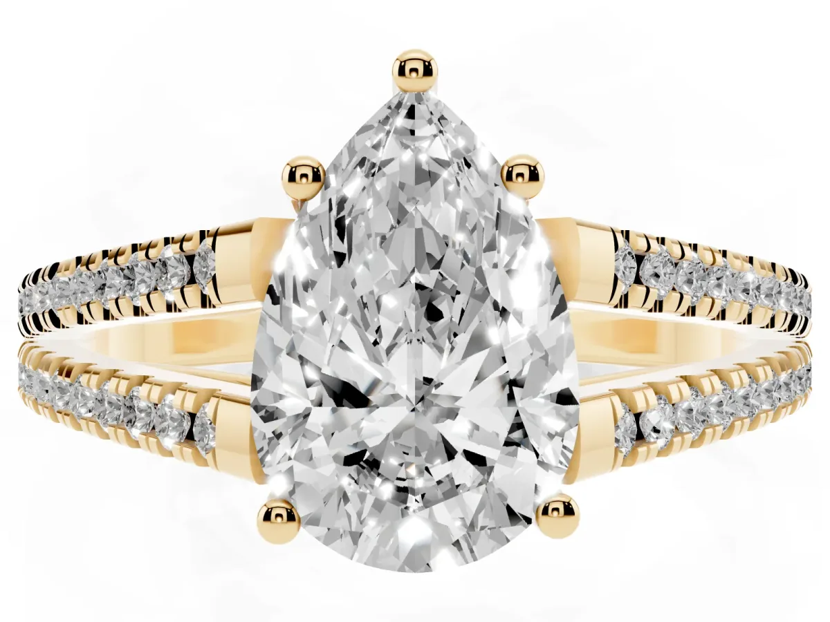 Pear Cut Diamond Solitaire Engagement Ring with Split Shank Pavé Band Yellow gold