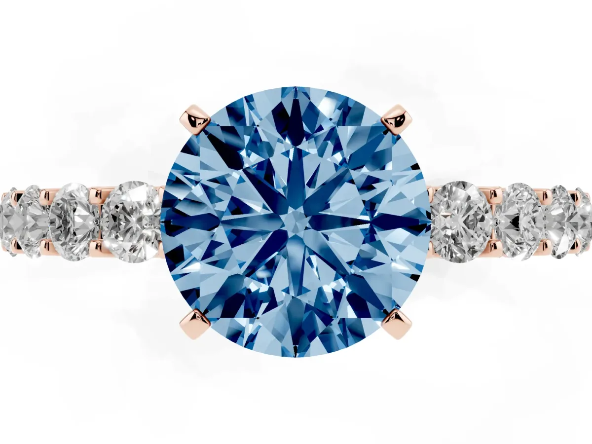 Fancy Blue Round Cut Diamond Solitaire Ring with Shared Prong Pavé Band and Four-Prong Setting Rose gold