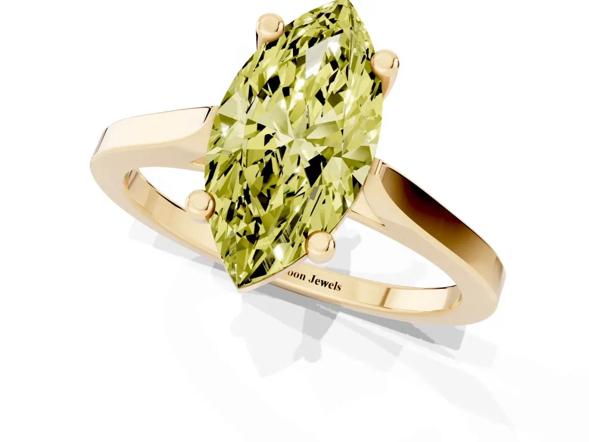 Fancy Yellow Marquise Cut Solitaire Diamond Ring with Four-Prong Setting and Tapered Band Yellow gold