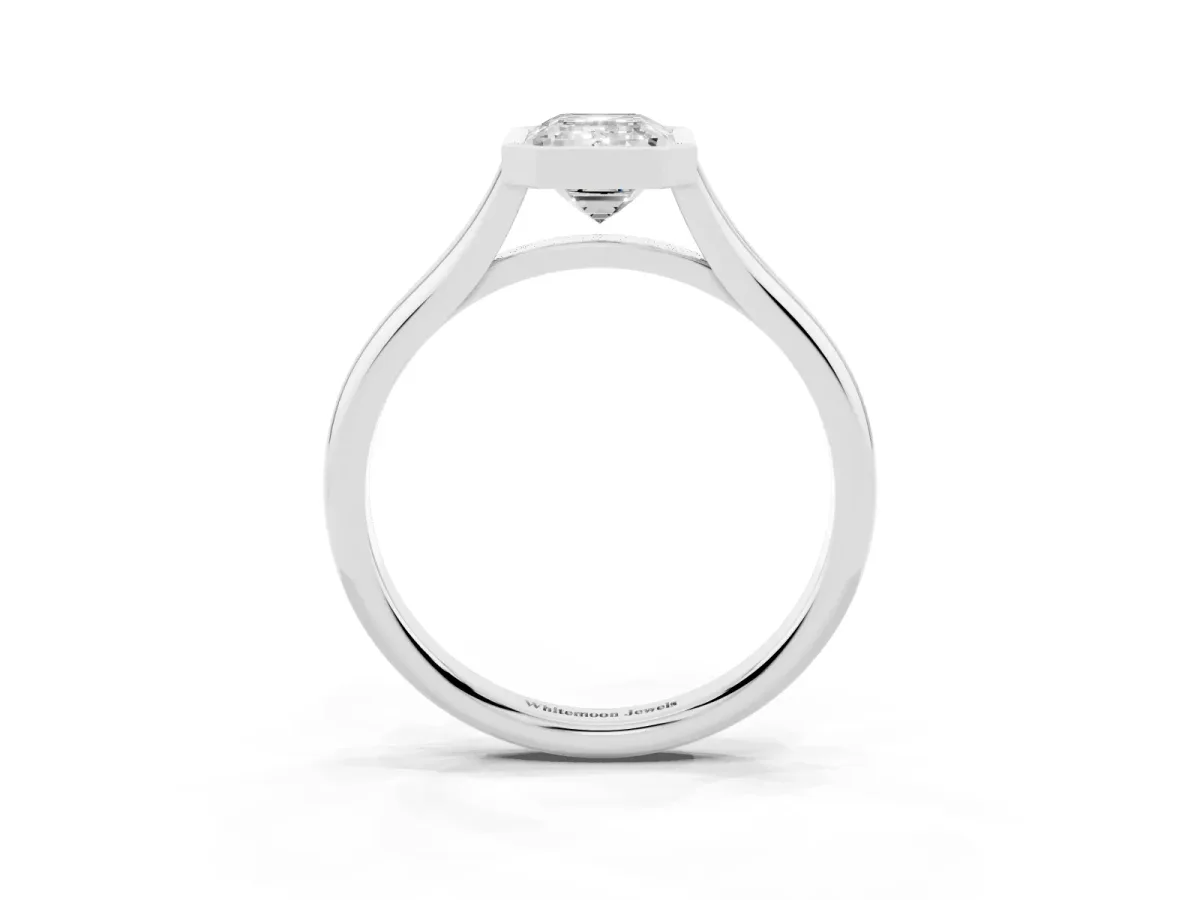 Bezel Set Emerald Cut Cut Solitaire Ring with Tapered Band Silver