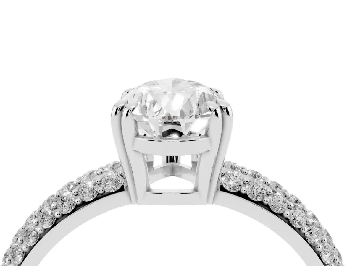 Pear Cut Diamond Solitaire Ring with Multi-Row Round Pavé Band and Prong Setting Silver