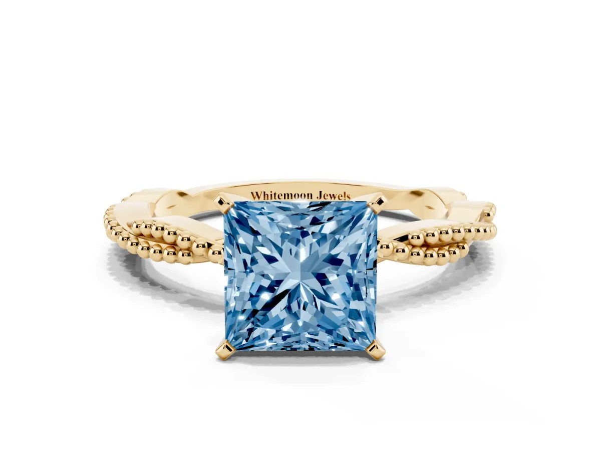 Fancy Blue Princess Cut Solitaire Twisted Band with Bead Prong Setting Yellow gold