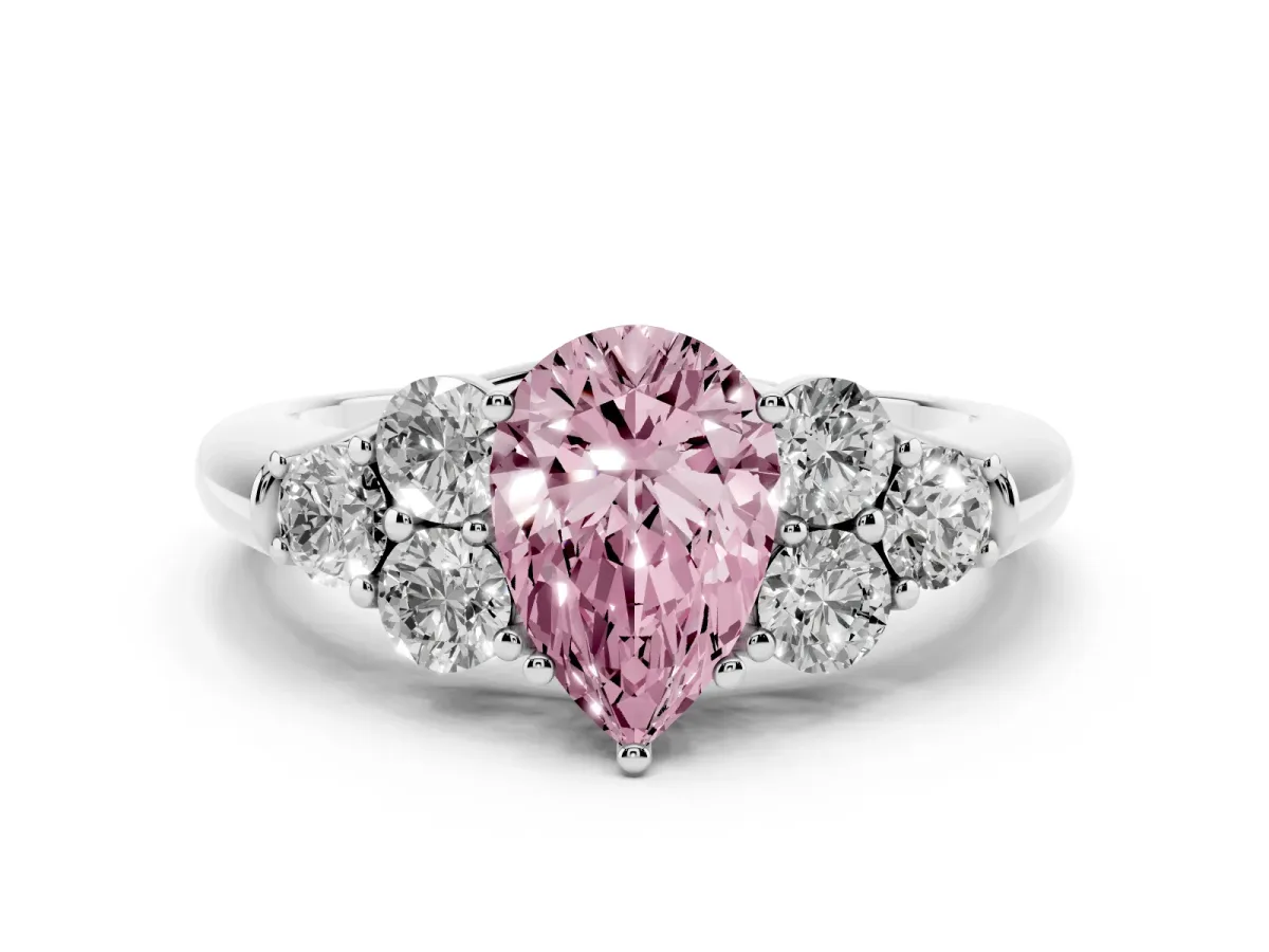 Fancy Pink Pear Cut Cut Diamond Cluster Ring with Round Accent Stones and Prong Setting on a Classic Band White gold
