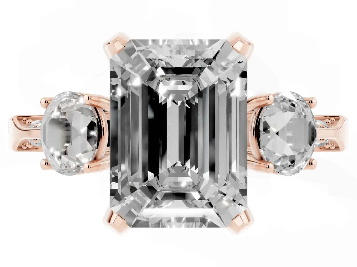 Fancy Blue Emerald Cut Brilliant Three-Stone Diamond Ring with Pavé Band and Four-Prong Setting Rose gold