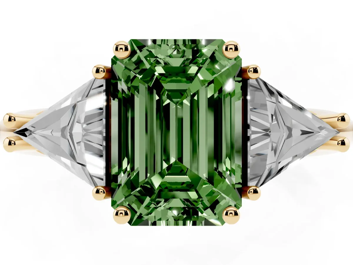 Fancy Green Three-Stone Emerald Cut Diamond Engagement Ring with Trillion Side Stones and Prong Setting Yellow gold
