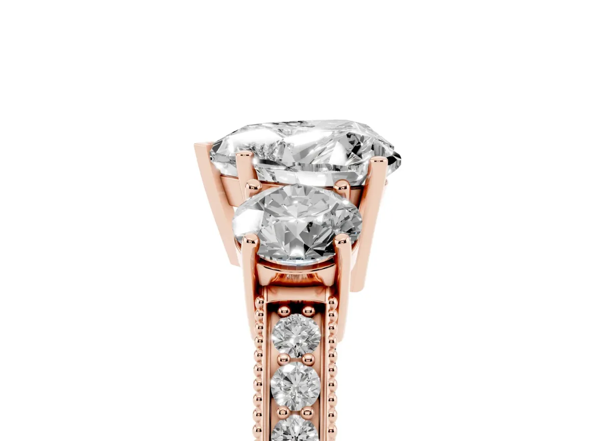Heart Cut Three-Stone Diamond Ring with Pavé Band and Four-Prong Setting Rose gold